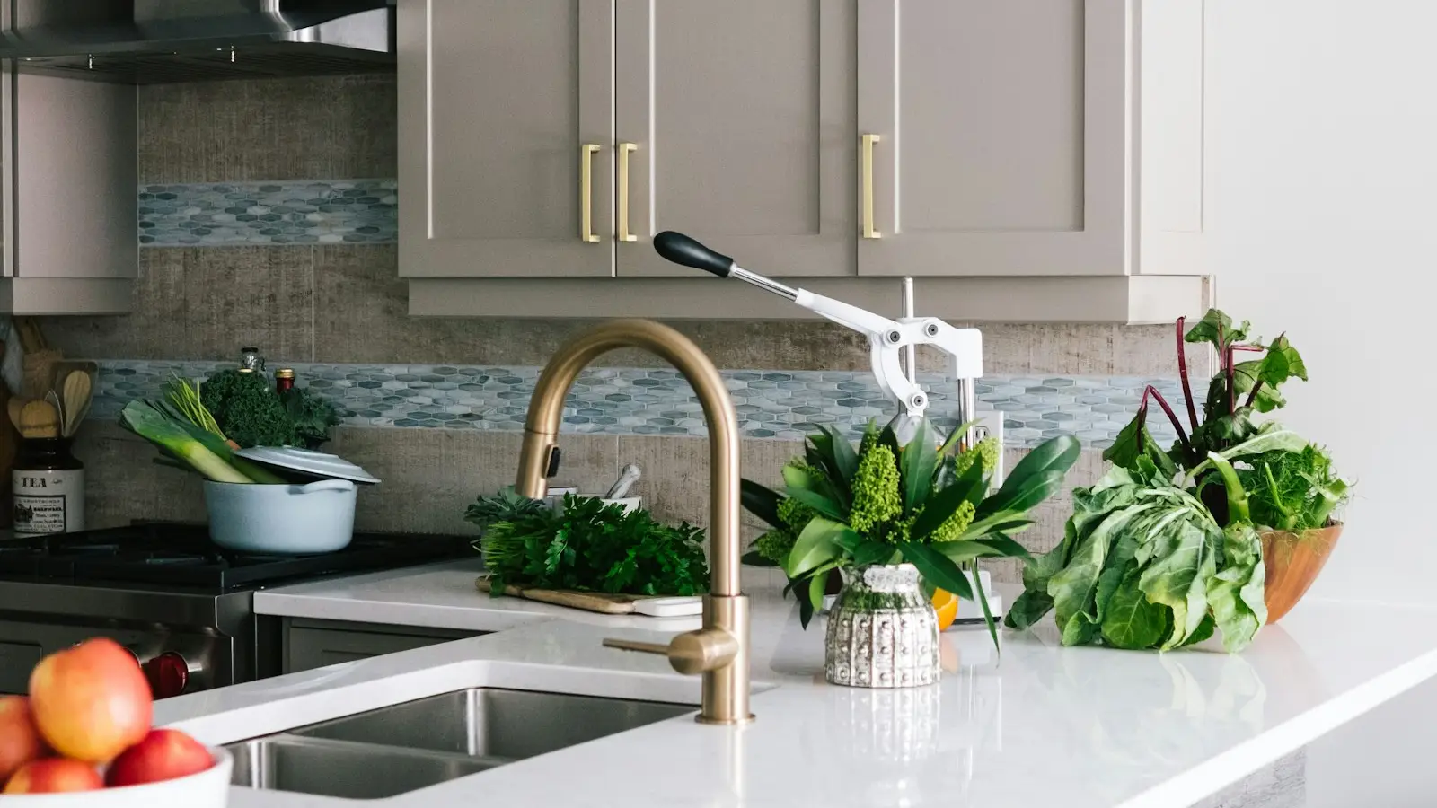 Classic shaker kitchen with taupe framed doors and a marble bar counter.